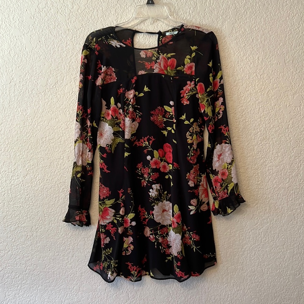 Flowy black long sleeve dress with red floral print